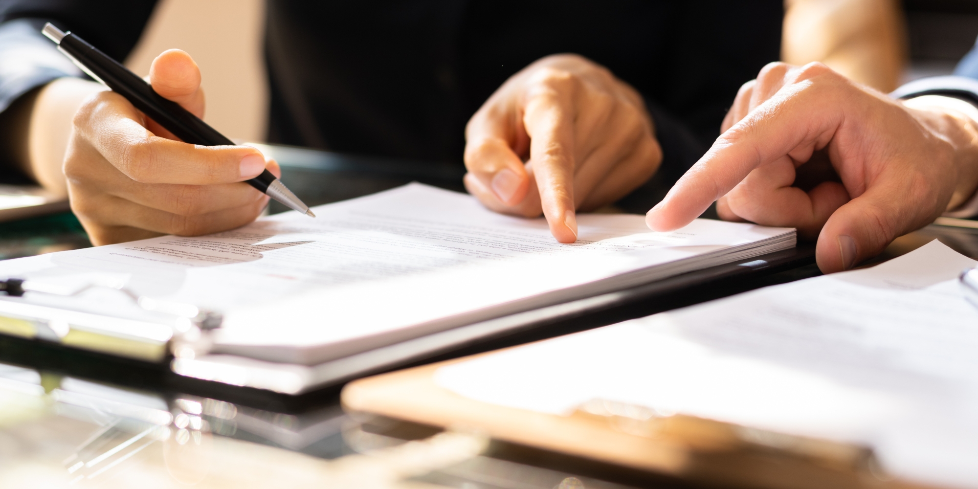 People reviewing documents together