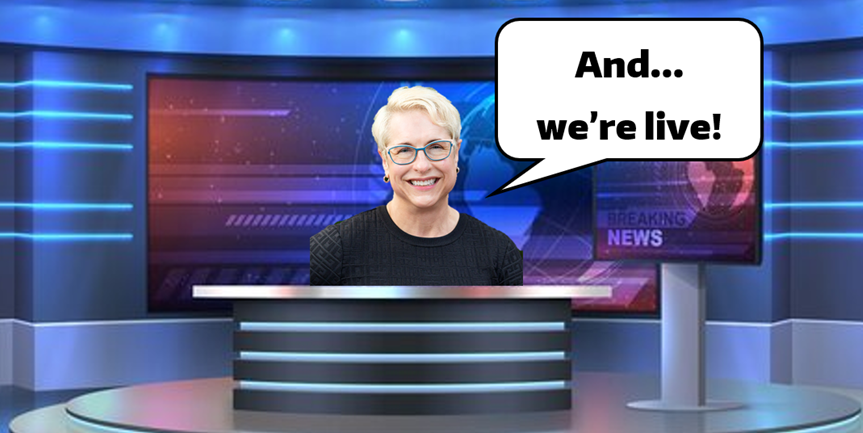 Linda Nelson as a news anchor announcing, "And... we're live!"