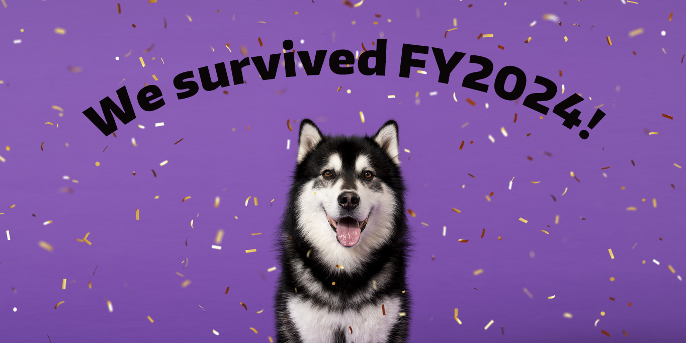 Dubs with confetti and text above his head that says, "We survived FY2024!"